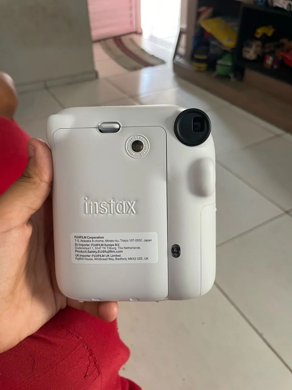 Instax mini 12 + cartucho com 10 poses e pilha  - Foto 3