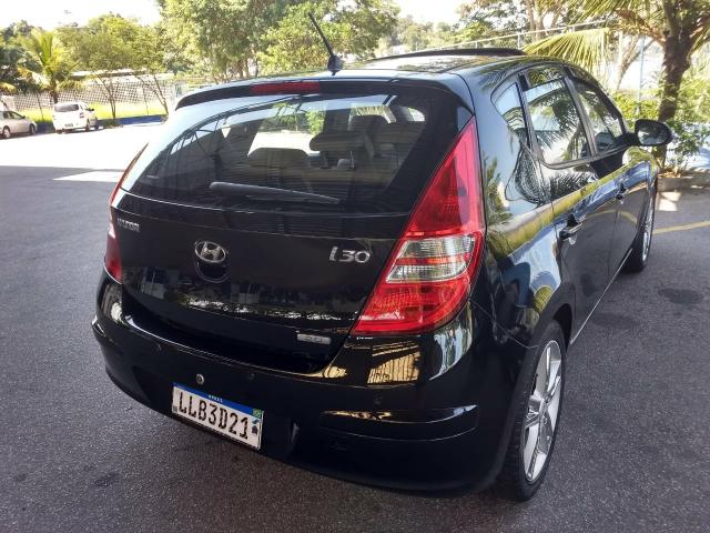 Hyundai i30 2010 automático top com teto - Foto 8