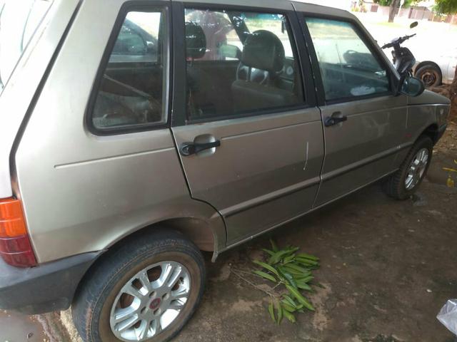 Carro Fiat uno Mille Fire 2002 número :