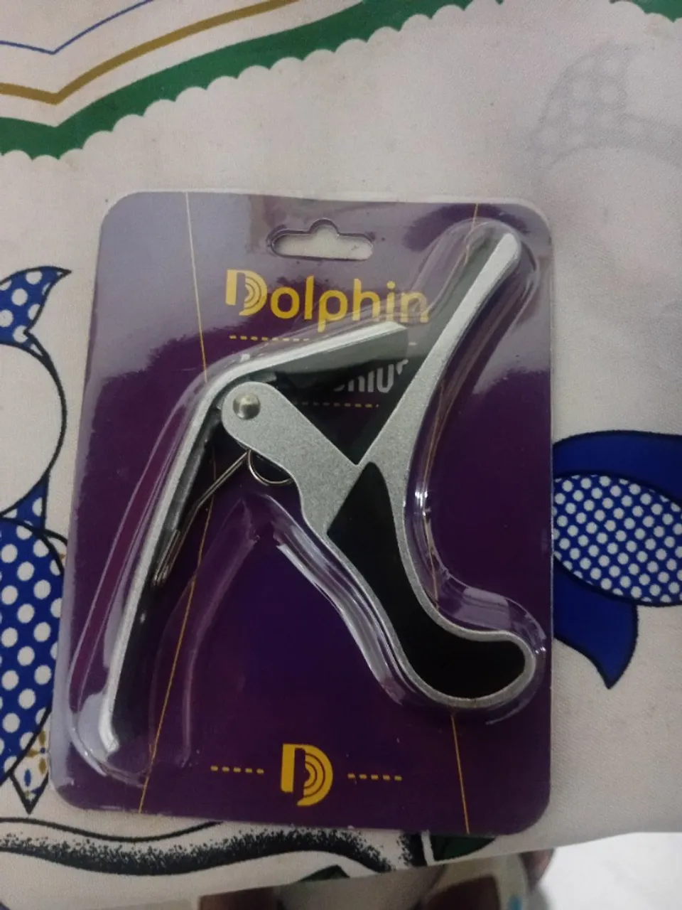 Capotraste para violão e guitarra.