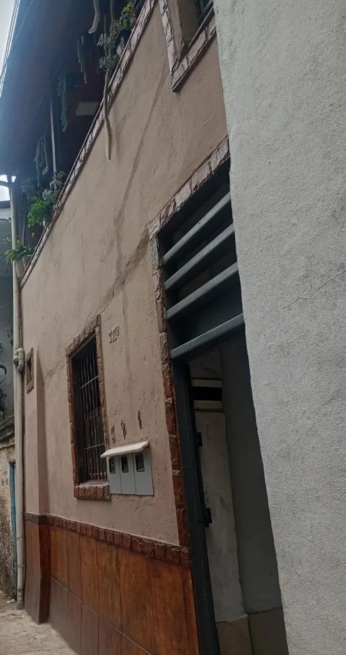 Vendo terreno com 3 casas 