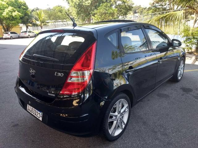 Hyundai i30 2010 automático top com teto - Foto 6