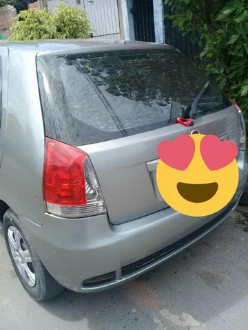 Vendo ou troco por um carro de menos valor com volta pra mim - Foto 6