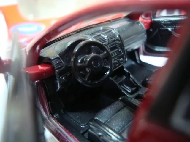 Miniatura Volkswagen Golf V 1/32 Welly Lacrado #79158 - Foto 2