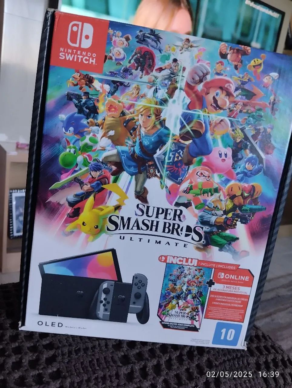 Nintendo Switch OLED + Super Smash Bros Ultimate+ Mário Odyssey físico.