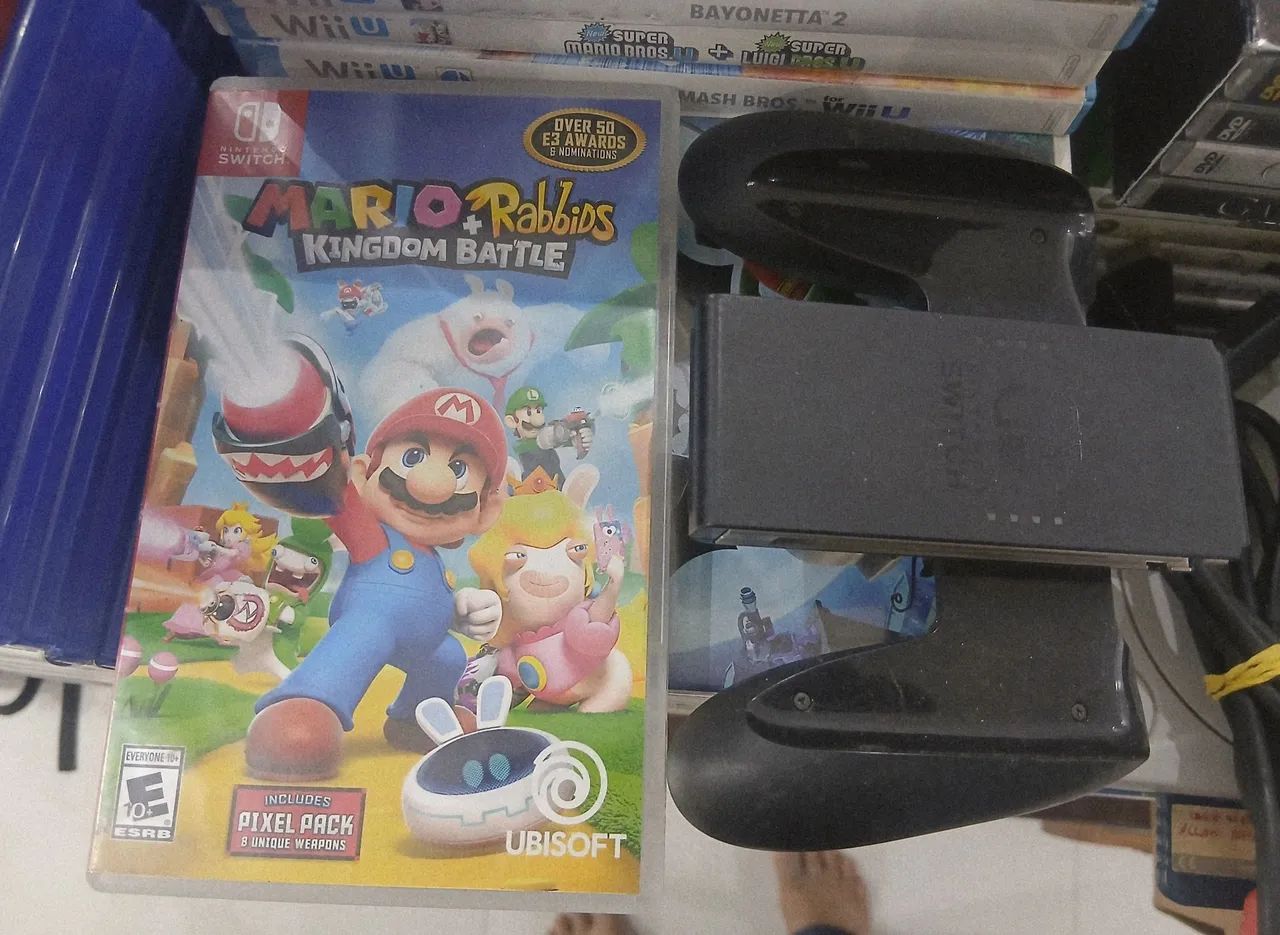 Jogo + Acessório de nitendo switch 