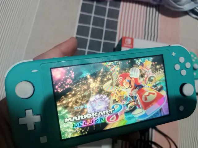 Nintendo switch lite c/ jogo pokémon sword em Santos