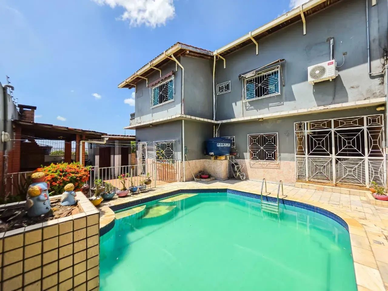 CASA COM ENERGIA SOLAR  CONJUNTO AJURICABA- PLANALTO