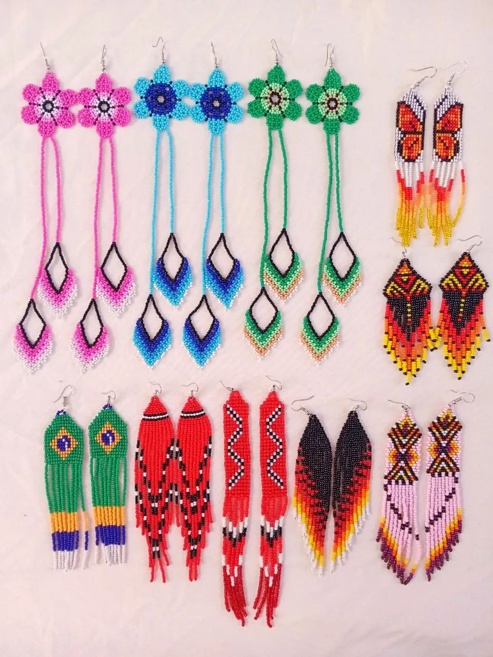 Brincos coloridos 3 por 100,00 