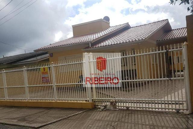 Casa com 2 dormitórios à venda, 130 m² por R$ 270.000 - Nova Divinéia - Araranguá/SC