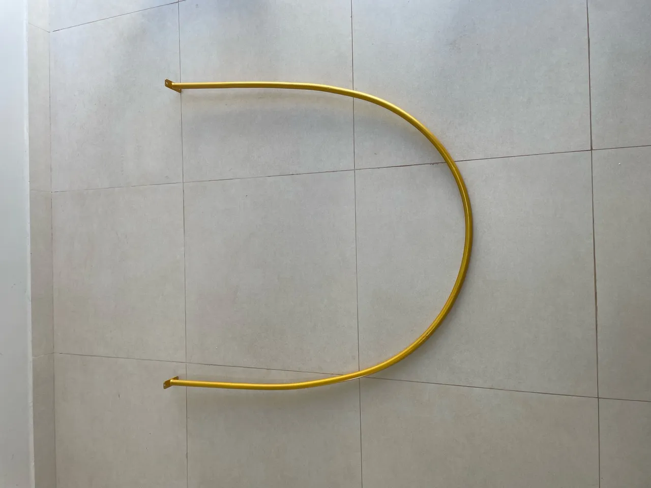 Arco dourado vestiário para provador