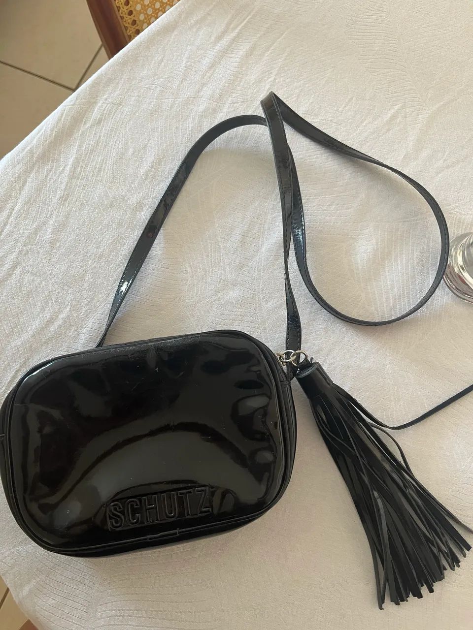 Bolsa Schütz com Marcas de Uso 