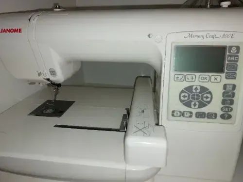 Máquina de bordar Janome MC220E65115402841859123
