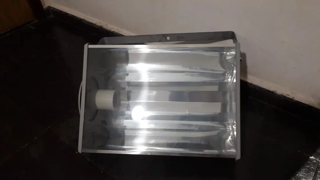 Vendo refletores novos na caixa