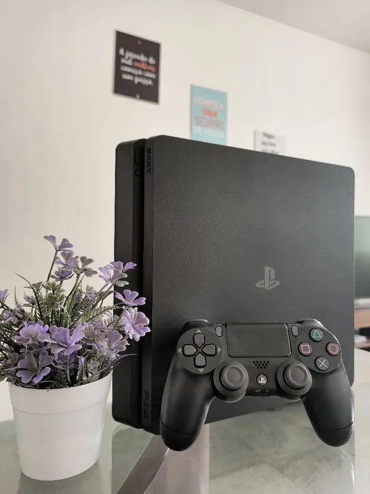 PS4 Slim 1 TB semi novo com caixa 