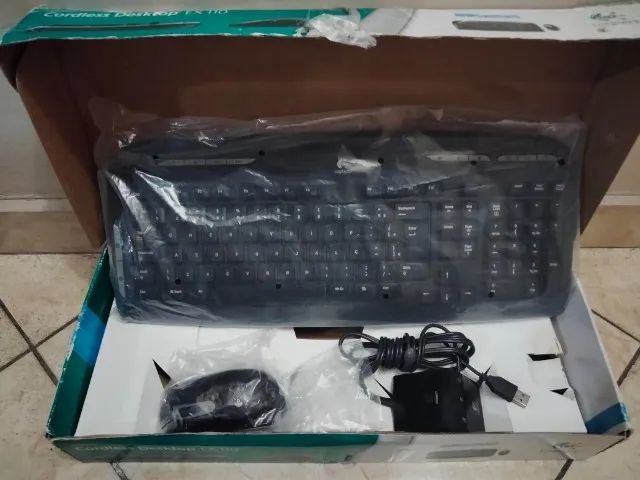 Teclado logitech + Mouse e adapator sem fio na caixa - Foto 3