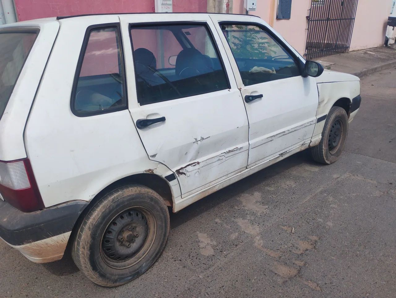 Vende-se uno 2006 tem ar precisa de manutenção - Foto 3