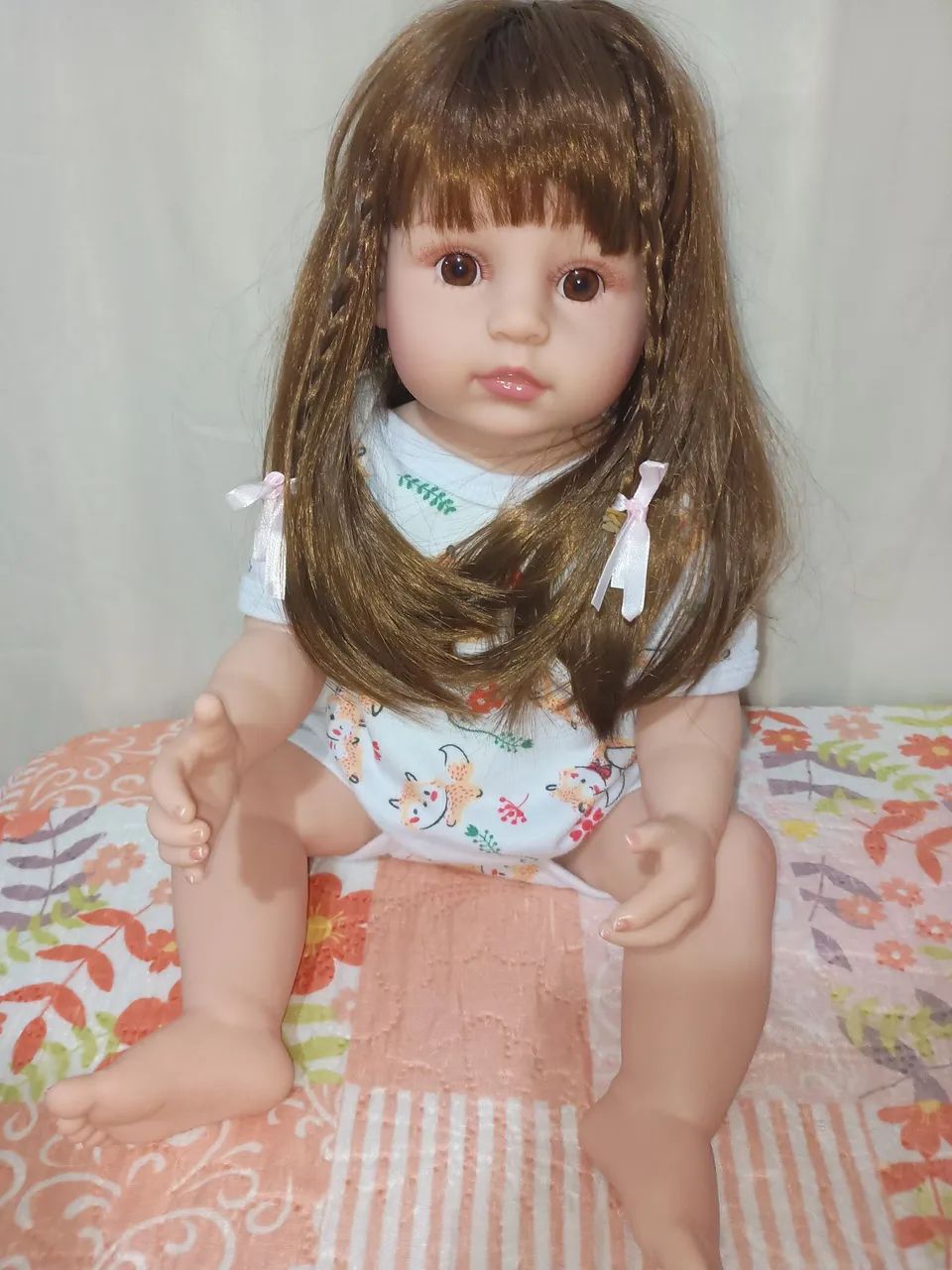 Boneca Reborn menina de trancinhas  - Foto 4