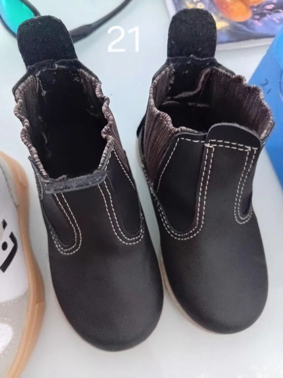 Tênis e bota infantil