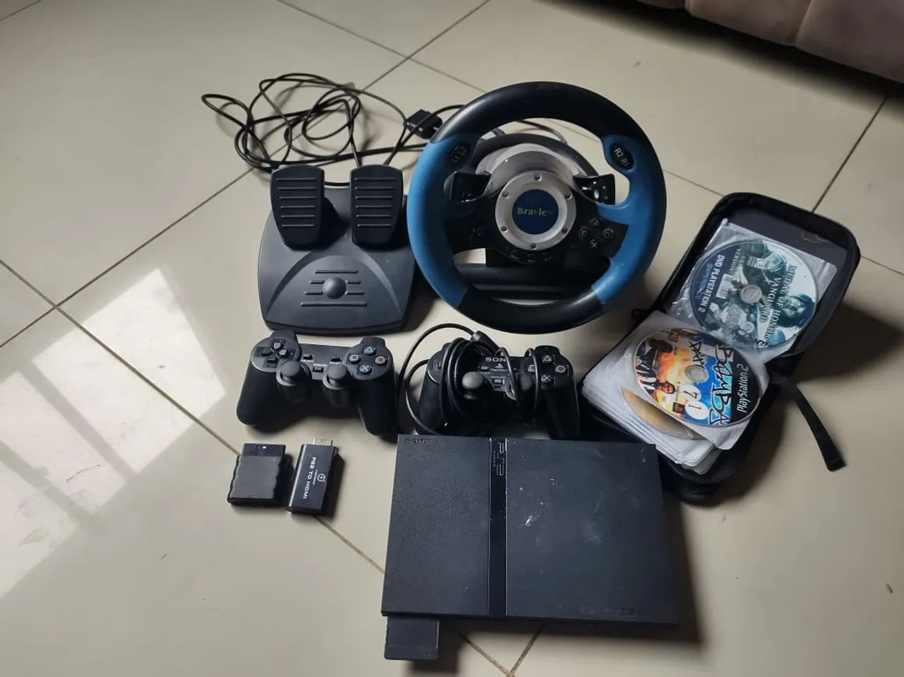 Volante e play 2 . E corrente de prata 