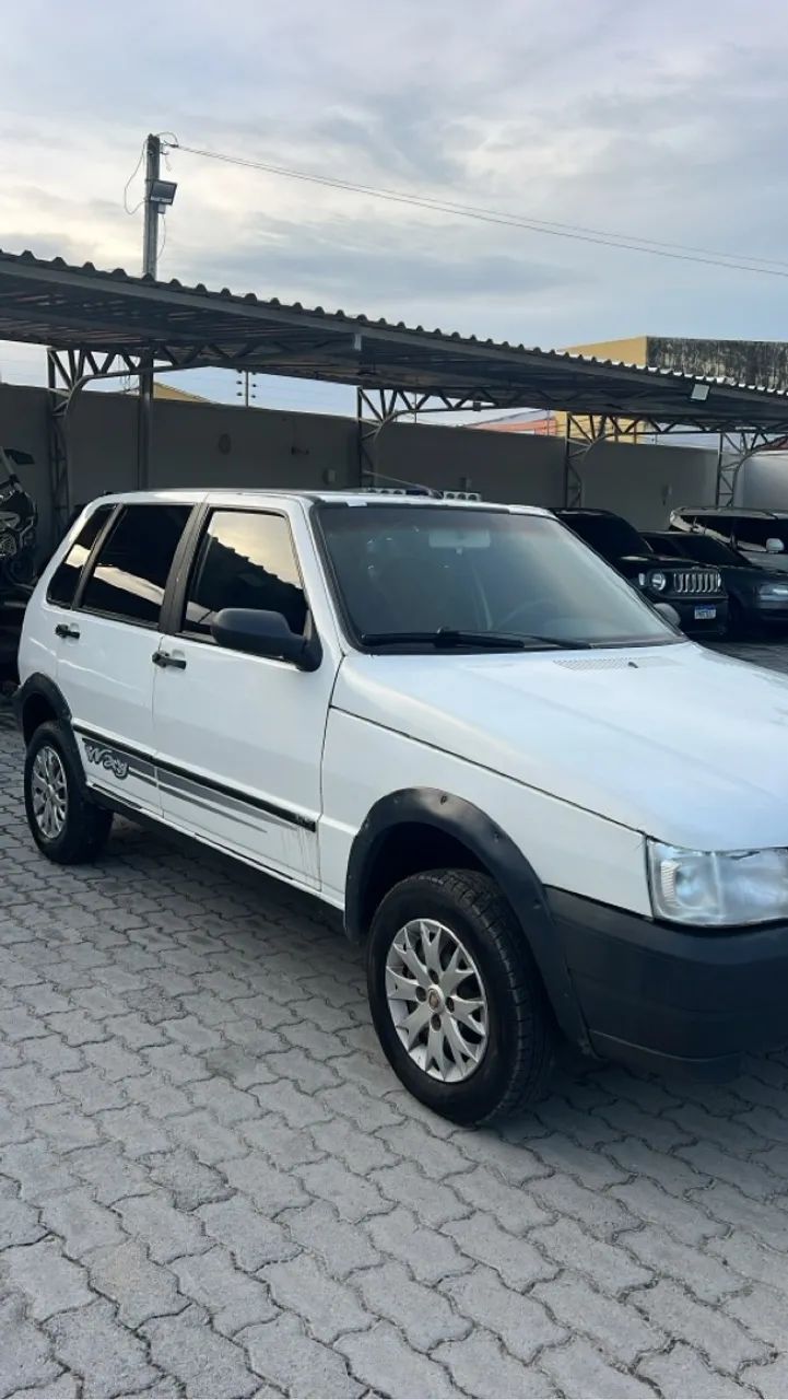 Fiat uno 2010 com ar gelando 