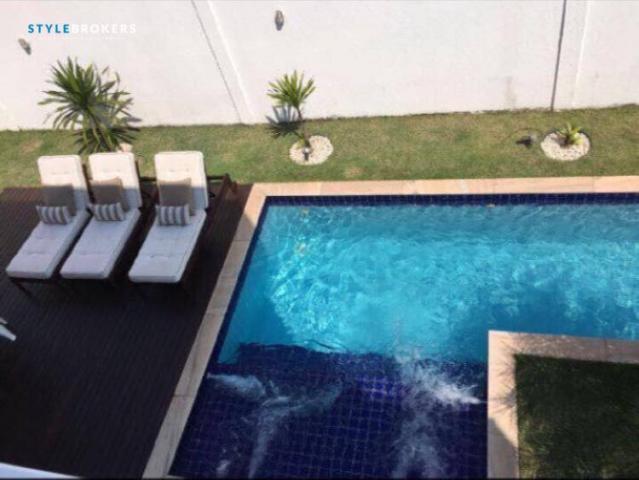 Casa estilo sobrado no Condomínio Alphaville 1 com 4 dormitórios à venda, 329 m² por R$ 1.