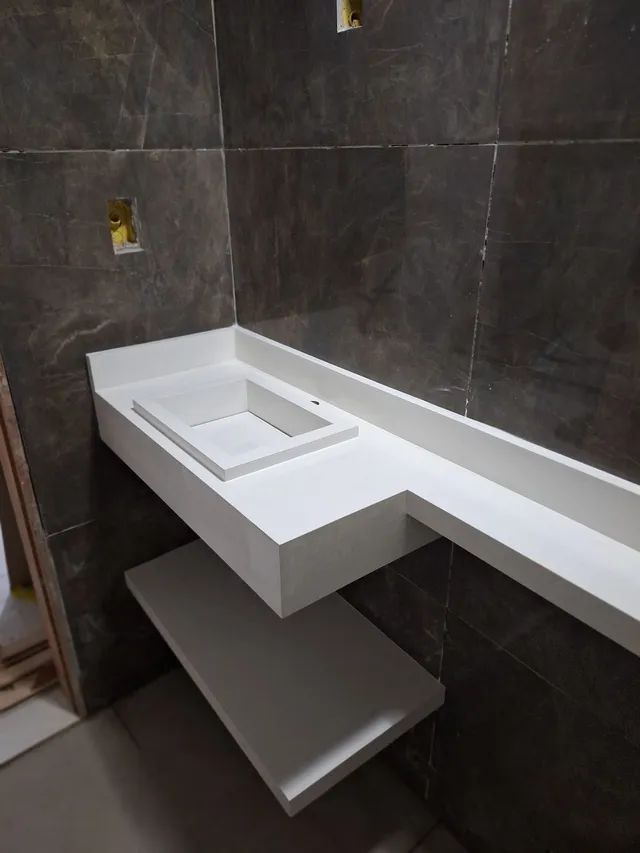 Bancadas,lavatorios,pias esculpidas em porcelanato.