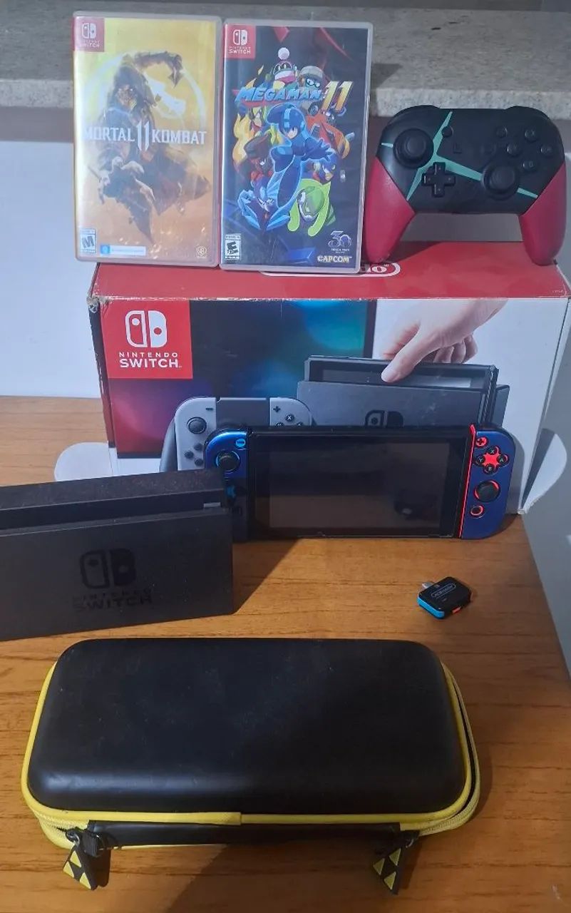 Nintendo Switch com jogos e acessórios