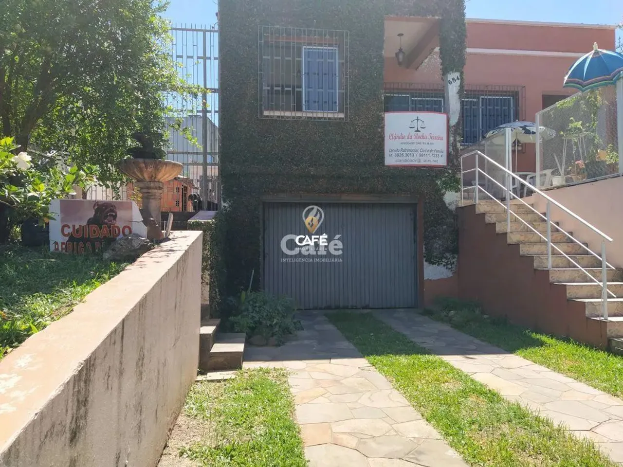 Casa com 4 dormitórios, piscina, pátio, em bairro central, Santa Maria/RS.