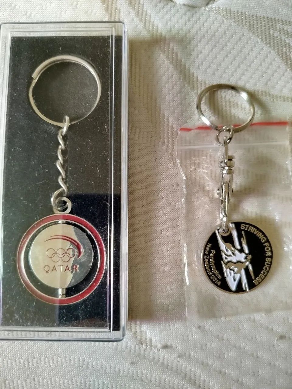 2 chaveiros Olímpicos Qtar e Nova Zelândia 