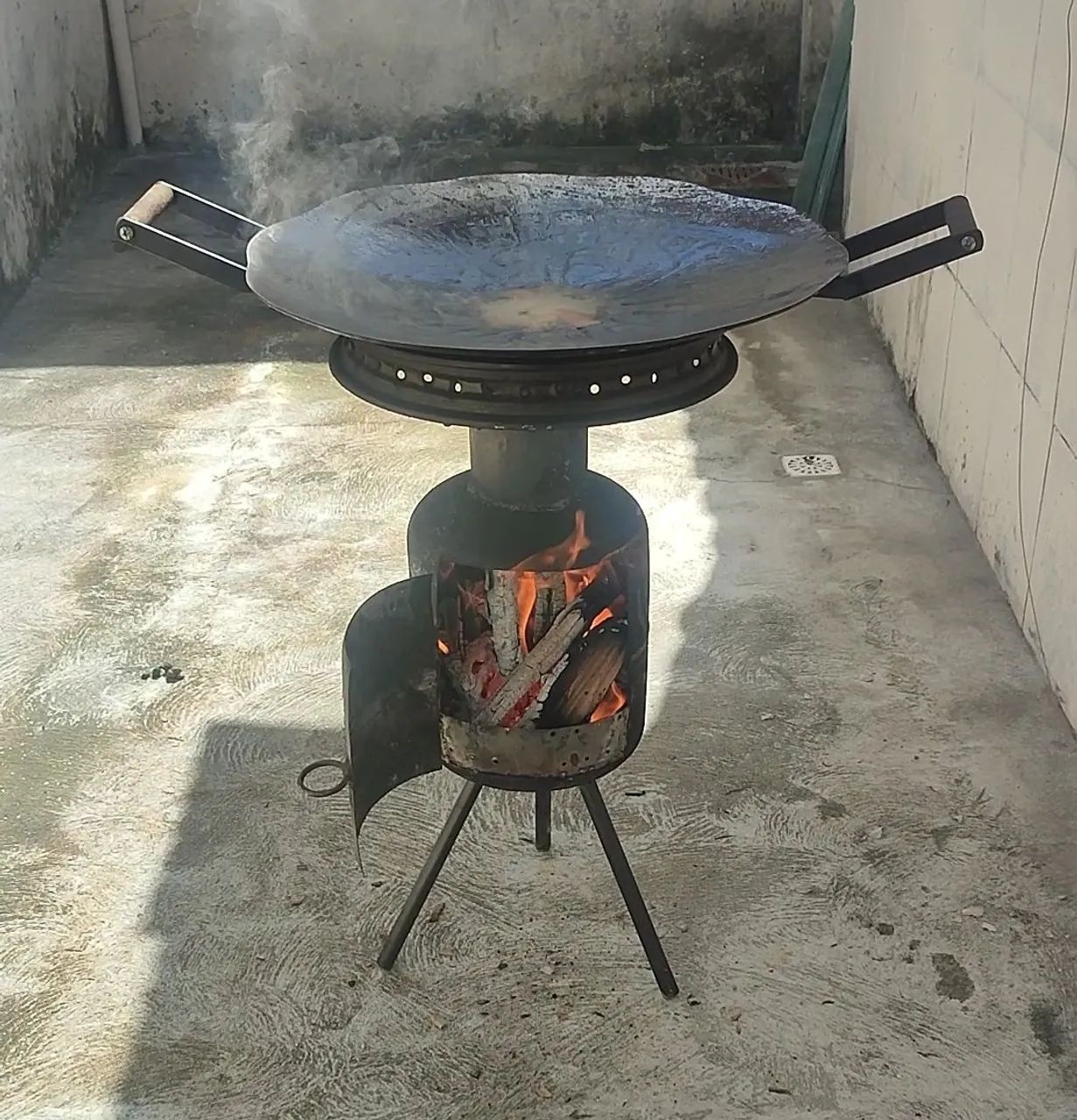 Disco de arado e churrasqueira 