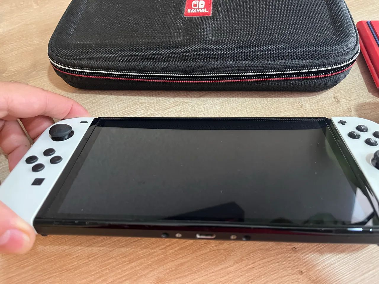 Nintendo switch Oled + 2 jogos - Foto 5