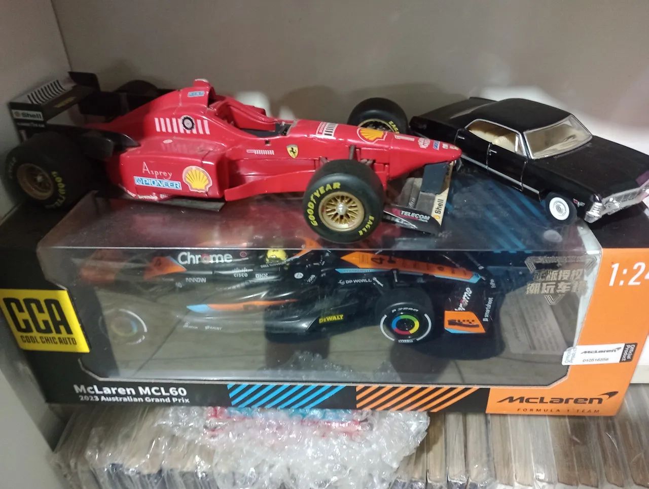 Lote de carrinhos Formula 1 e Impala