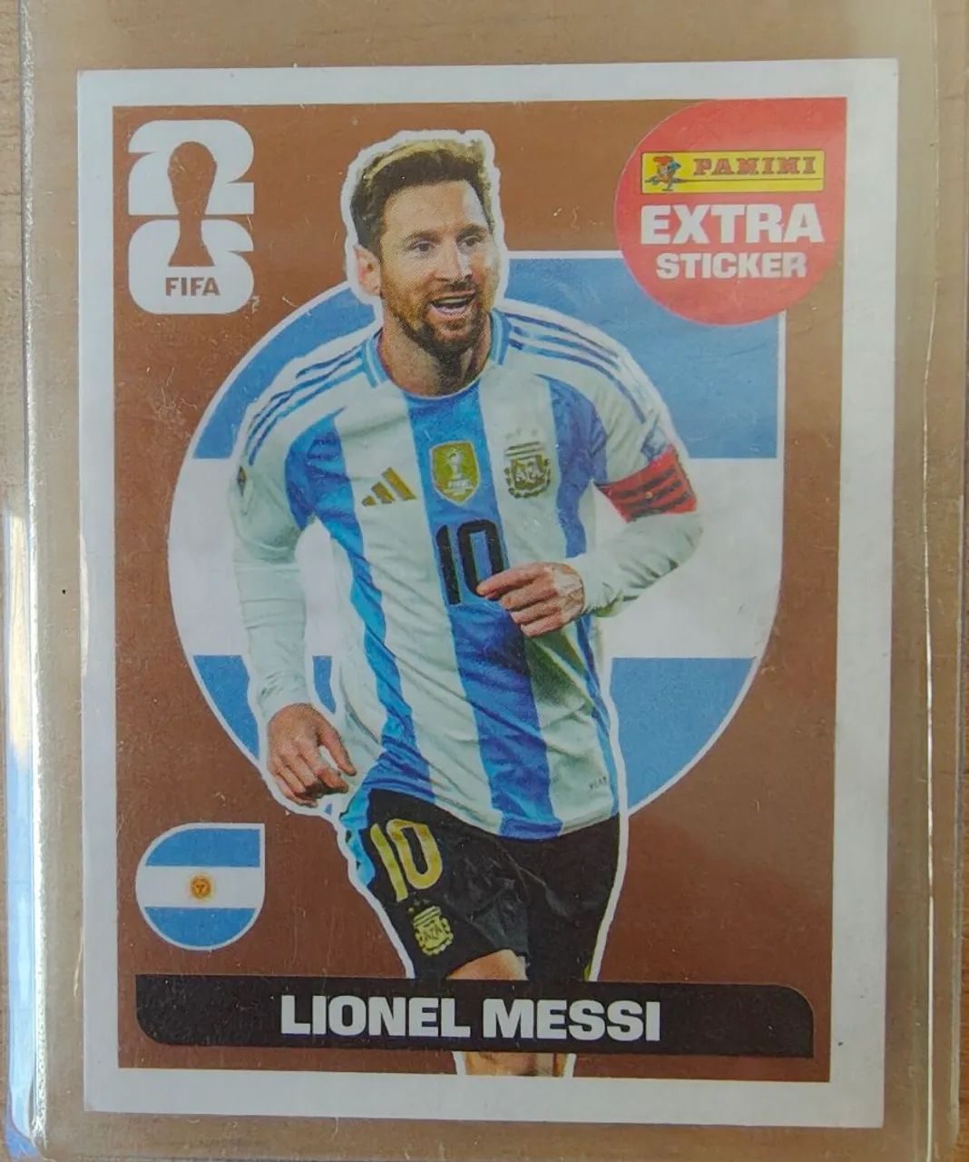 Figurinha Legend bronze do Messi.