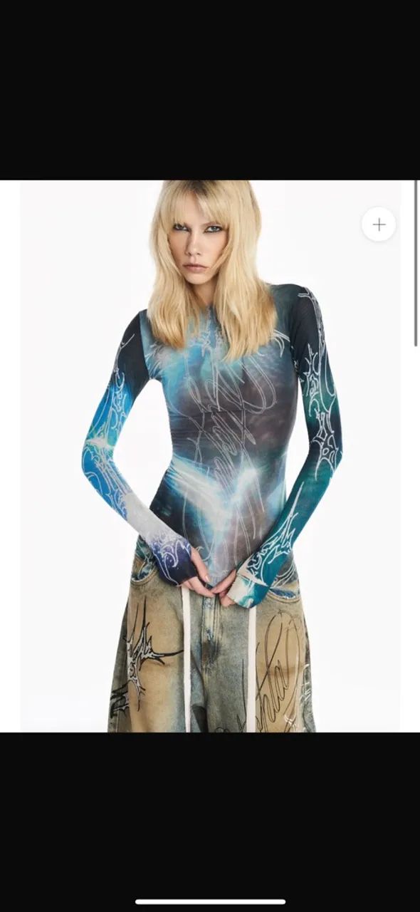 Tig nova blusa!