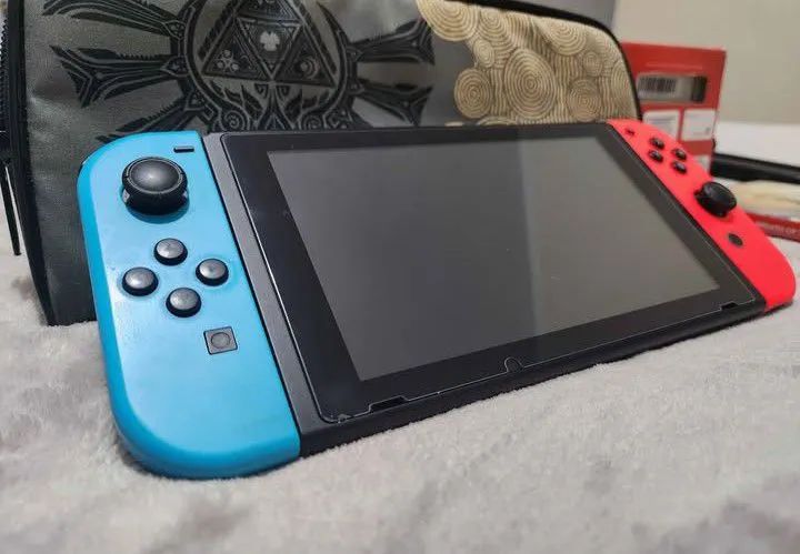 Nintendo Switch V2 + Zelda BOTW  - Foto 3