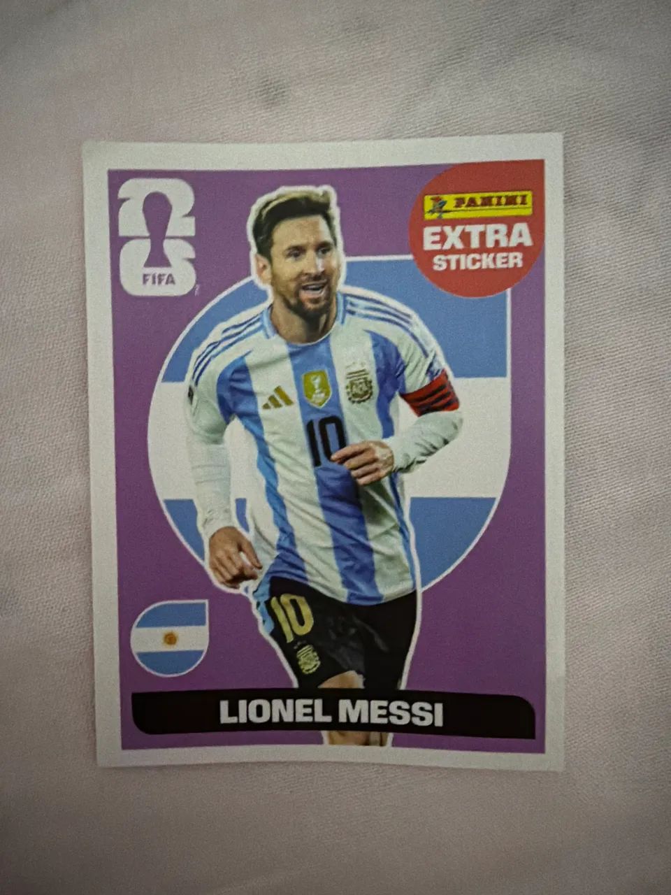 Figurinha Lionel Messi roxa 2026 Panini