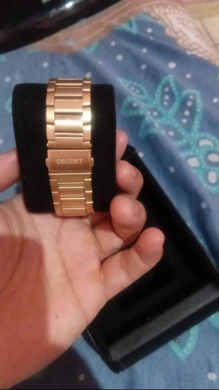 Relógio oriente dourado semi novo  - Foto 2