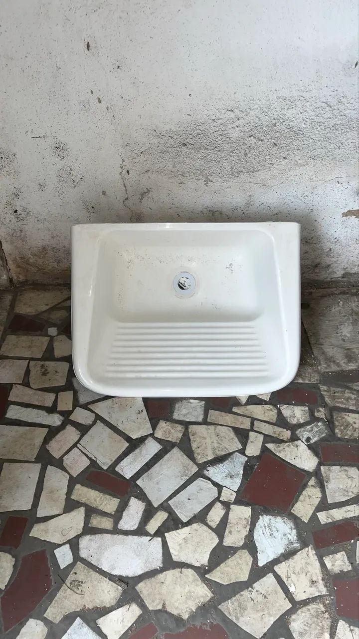 Taque de lavar roupas