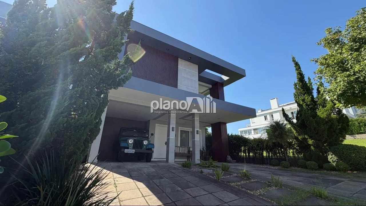 Casa mobiliada no condomínio Alphaville em Gravataí com 4 quartos sendo 1 suíte master