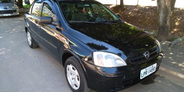 Corsa Max 1.8 com GNV, completo sedam