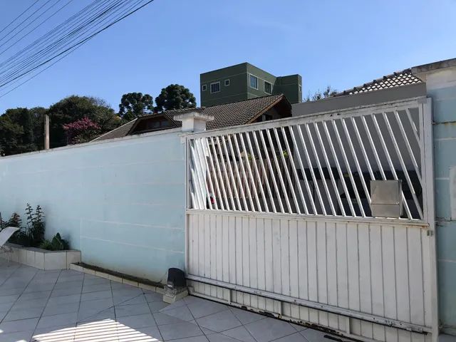 Duas casas geminadas de madeira, à venda, Cristo Rei, Campo Largo