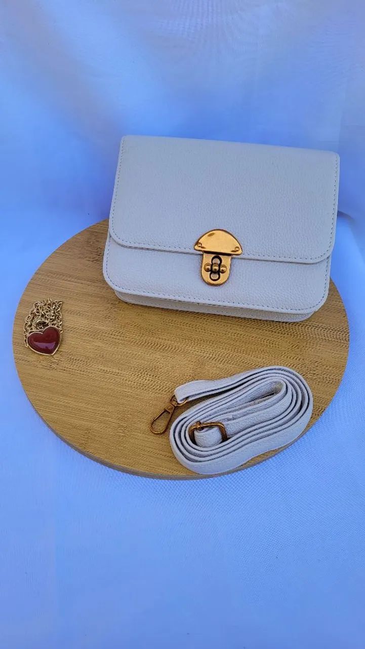 Bolsa off com alça transversal removível e ajustável