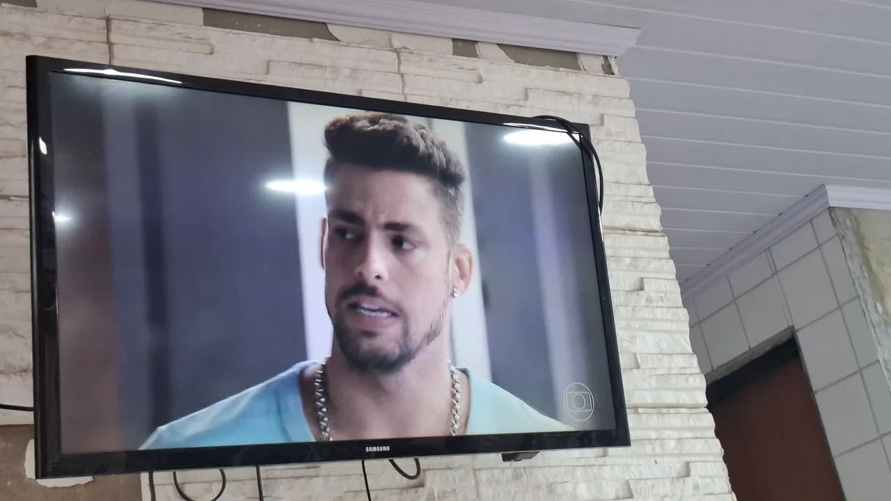 Tv 32 polegar