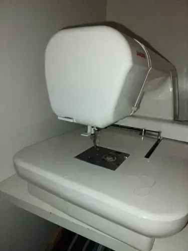 Máquina de bordar Janome MC220E65115402841859124