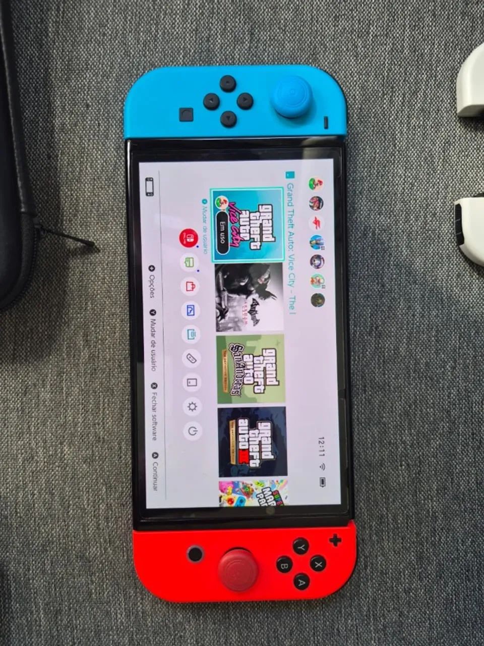 NINTENDO SWITCH OLED 64GB + SD 256GB - Foto 3