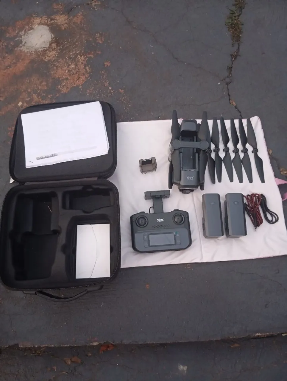 Drone SJRC com acessórios