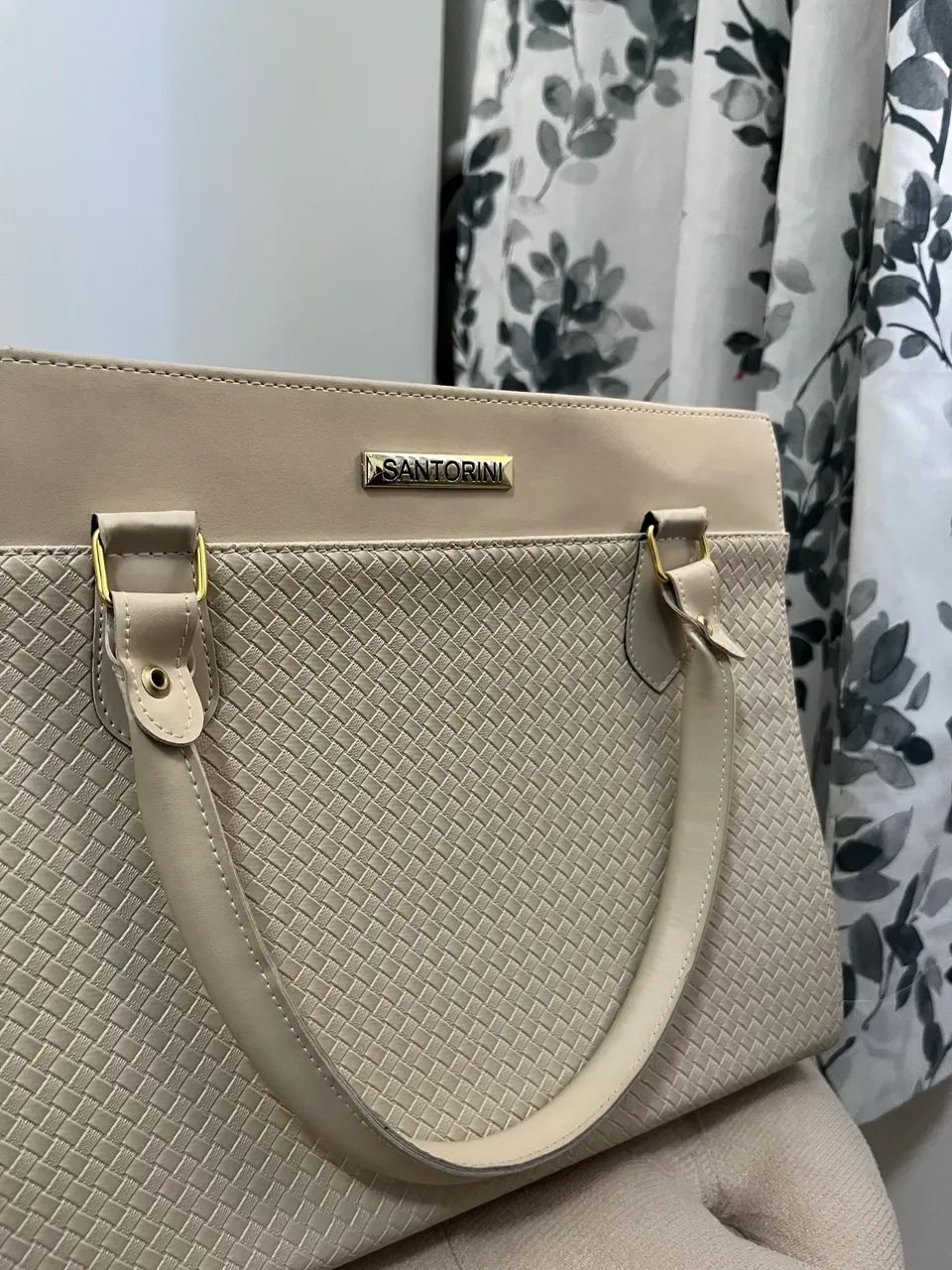 Bolsa feminina de mão.  