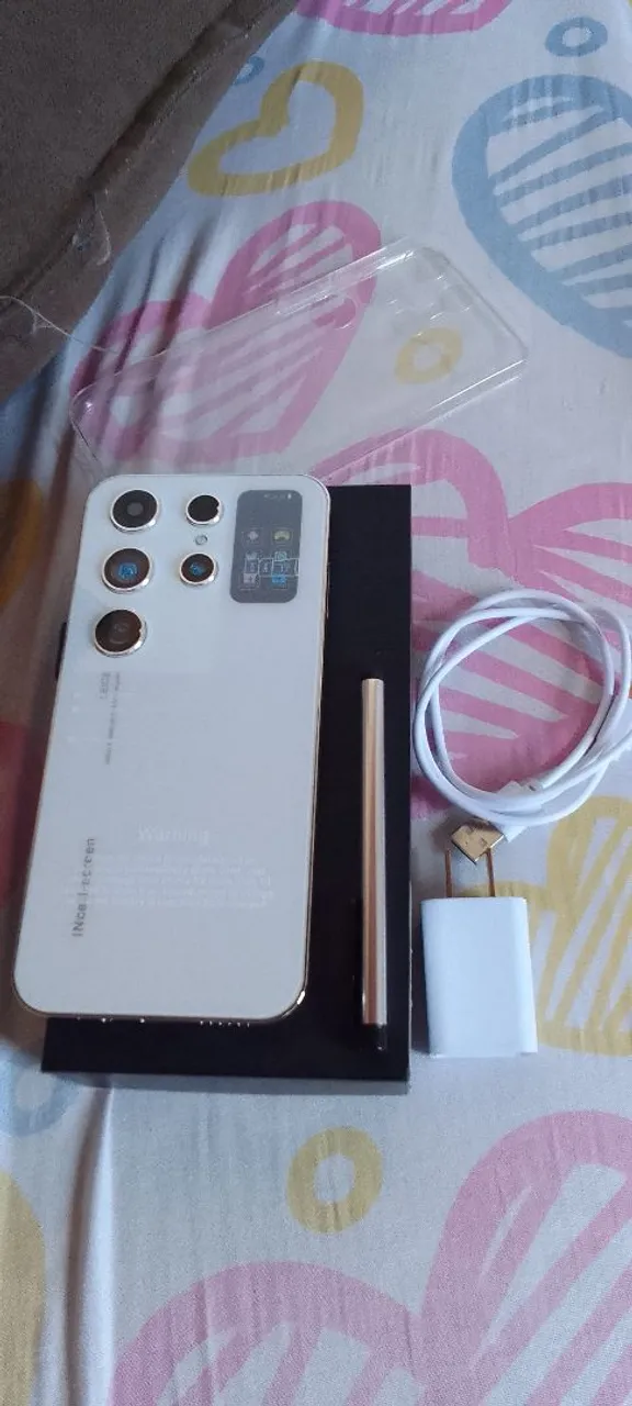1500 celular novo na caixa carregador fone e a caneta