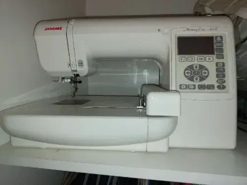 Máquina de bordar Janome MC220E65115402841859120